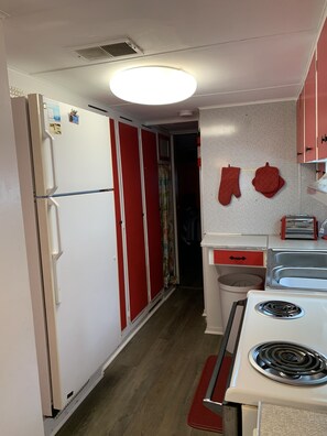 Kitchen looking into 2nd bedroom