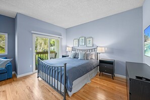 Master Bedroom with King Bed, Patio, and TV