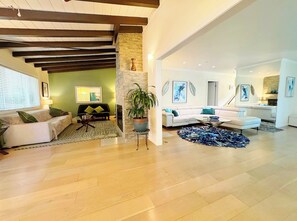 Open concept of breezeway, living room 1 and 2