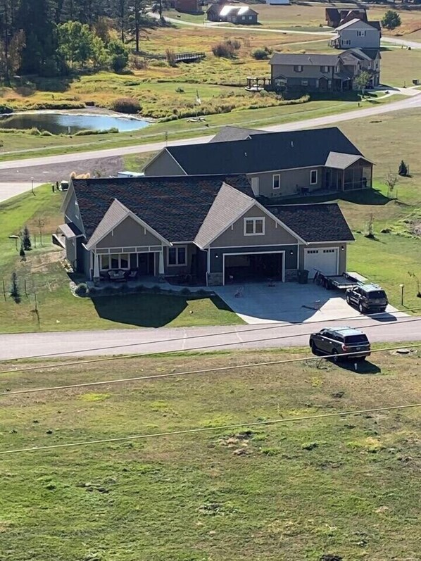 aerial view of house from the mountain directly out the front door.