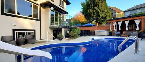 Enjoy our shared outdoor space with pool, hot tub and gazebo