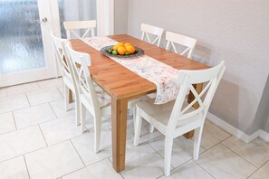 Dining room in our License to Chill, Largo vacation rental with heated pool.