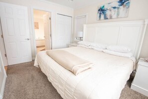 Experience our relaxing bedroom seamlessly connected to a full bathroom, creating a soothing and harmonious space for your comfort.