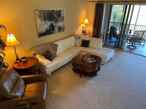 Tall ceilings. 
Living room with open sliders to large Lanai. 