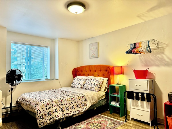 Micro studio apartment full size bed