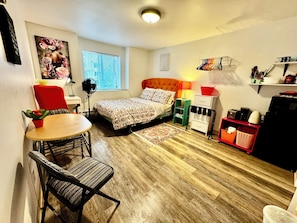 Micro studio apartment full size bed with amenities