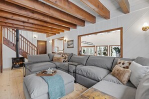 Unwind and relax on our massive sectional sofa. Pure comfort!