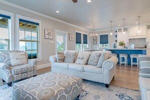 Open concept living space with view of kitchen are from living room.