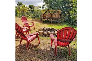 Exterior seating area next to the fire pit