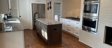 A chef's dream kitchen! Newly remodeled with Cafe appliances.