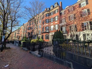 Just outside, the cobblestone sidewalks connect you to the historic neighborhood