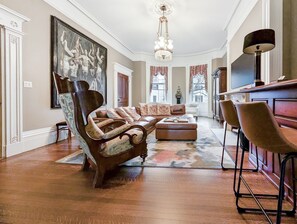 The second floor living room with 65" TV and plenty of cozy space