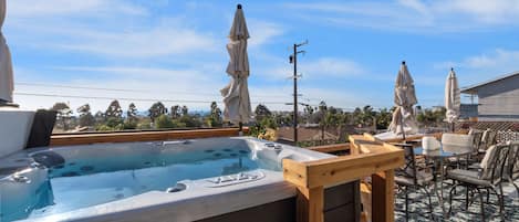 Hot tub and a beautiful west coast sunset - what more do you need? The hot tub is located on the main level.
