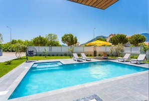 Private pool, terrace and garden area 