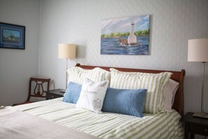 Welcome to the Cobourg Creek Cottage. A cozy and clean stay walking distance to downtown and the Cobourg beach. Bedroom 1 of 2 with Queen size bed.