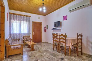 Theodora Apartment 1 Agios Stefanos Corfu Living Room and Dining Area 