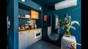 Fully equipped kitchenette with an oven-microwave, stove, electric kettle, coffee machine, toaster and mini fridge. #cooking #lovelystay