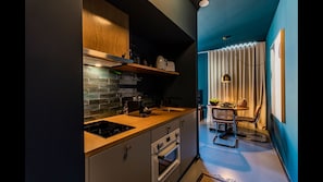 Nicely equipped kitchenette with a coffee machine, toaster, stove, kettle, and an oven-microwave for your homecooked meals! #kitchen #cooking