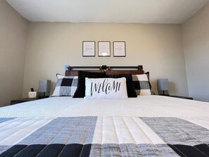 Experience a new perspective on relaxation in our master bedroom, where even the bed strikes a pose from a different angle!