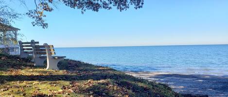 Benches, great for watching sunsets, overlookng private beach on Grandview Bay.