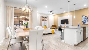 The art-inspired open-concept living area is perfect for entertaining.