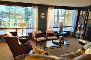 Large windows offer plenty of natural light & picturesque views of Lake Tomahawk