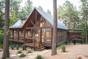 Nestled on a beautiful acre in the forest