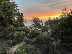 Sunset View of Garden and Ocean from 2nd Floor Balcony. photo taken January 2023