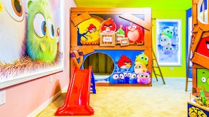 Drift into a peaceful sleep in our cozy Angry Birds themed bedroom, ensuring a restful night's sleep during your stay.