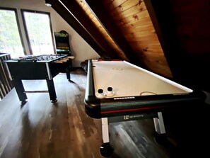 Game Room-Golden Tee , Ms. Pac-Man, air hockey and foosball