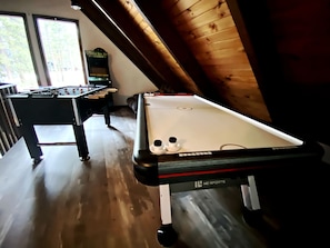Game Room-Golden Tee , Ms. Pac-Man, air hockey and foosball