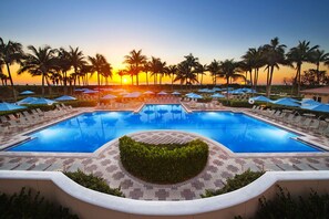 Relax Poolside at Sunset