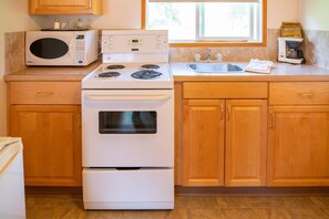 Cook a delicious meal in the kitchen.