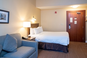Relax on the comfy bed after a day outside.