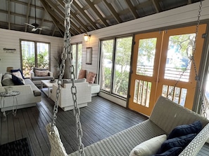 AMAZING LOUNGE AREA & BED SWING ON SCREENED IN FRONT PORCH