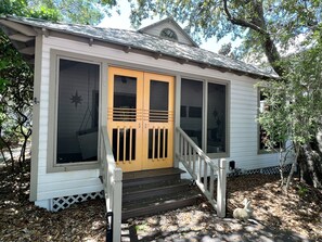 ENCLOSED FURNISHED FRONT PORCH