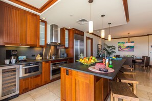 Spacious kitchen with modern appliances and an island counter