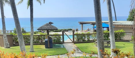 Lounge on your private lanai overlooking the crystal blue ocean and 1 of 3 pools