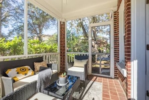Closed patio with rattan foamed chairs