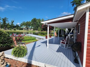 New deck and dock to moor your boat at the Cottage and enjoy lake views.