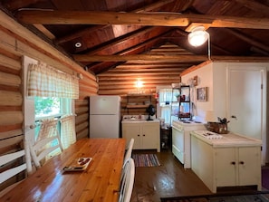 Open kitchen and dining space in Wilderness Bay Cabin #2