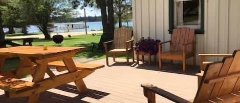 Porch view at Cedar Cottage! Perfect place for coffee and dining outdoors!