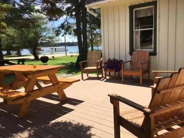 Porch view at Cedar Cottage! Perfect place for coffee and dining outdoors!