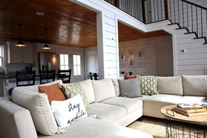 Living room- open floor plan with game room on second floor.