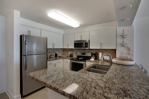 Indoors,Kitchen,Refrigerator,Floor,Sink