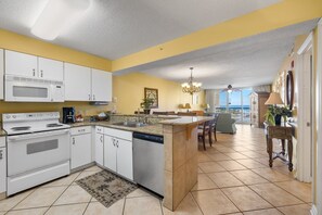 Floor,Flooring,Indoors,Kitchen,Microwave