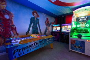 In-house arcade hall with Skee  Ball, Air Hockey, 2 Arcade machines, Basketball game and 2 Motorcycle games.