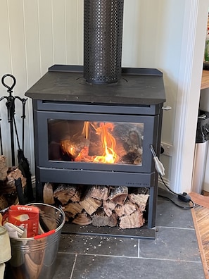 Warm new combustion stove to help with the cold nights