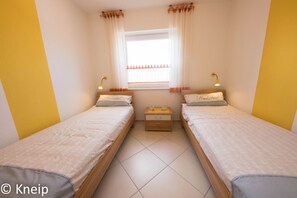 Schlafzimmer 2 mit zwei Einzelbetten