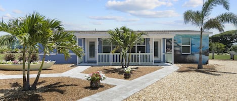 Newly Renovated Duplex in the heart of downtown Cocoa Beach!  This is our Turtle building, upon arrival you will be greeted by a beautiful sea turtle swimming in a crystal blue ocean!  Perfect to set the mood for island time!